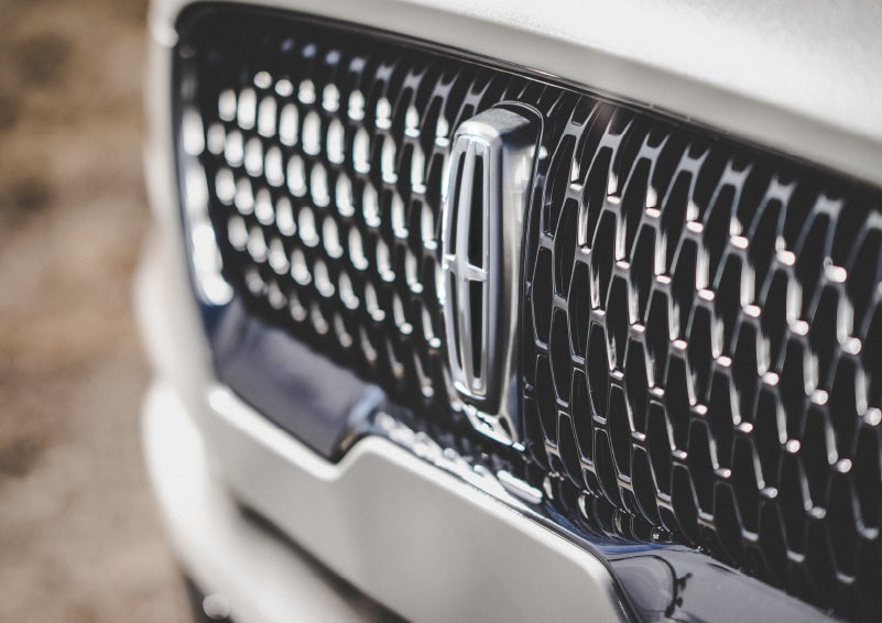 The grille of the 2024 Lincoln Aviator® Reserve model with an eye-catching repeated field of Lincoln Star logo shapes | Sentry Lincoln in Medford MA